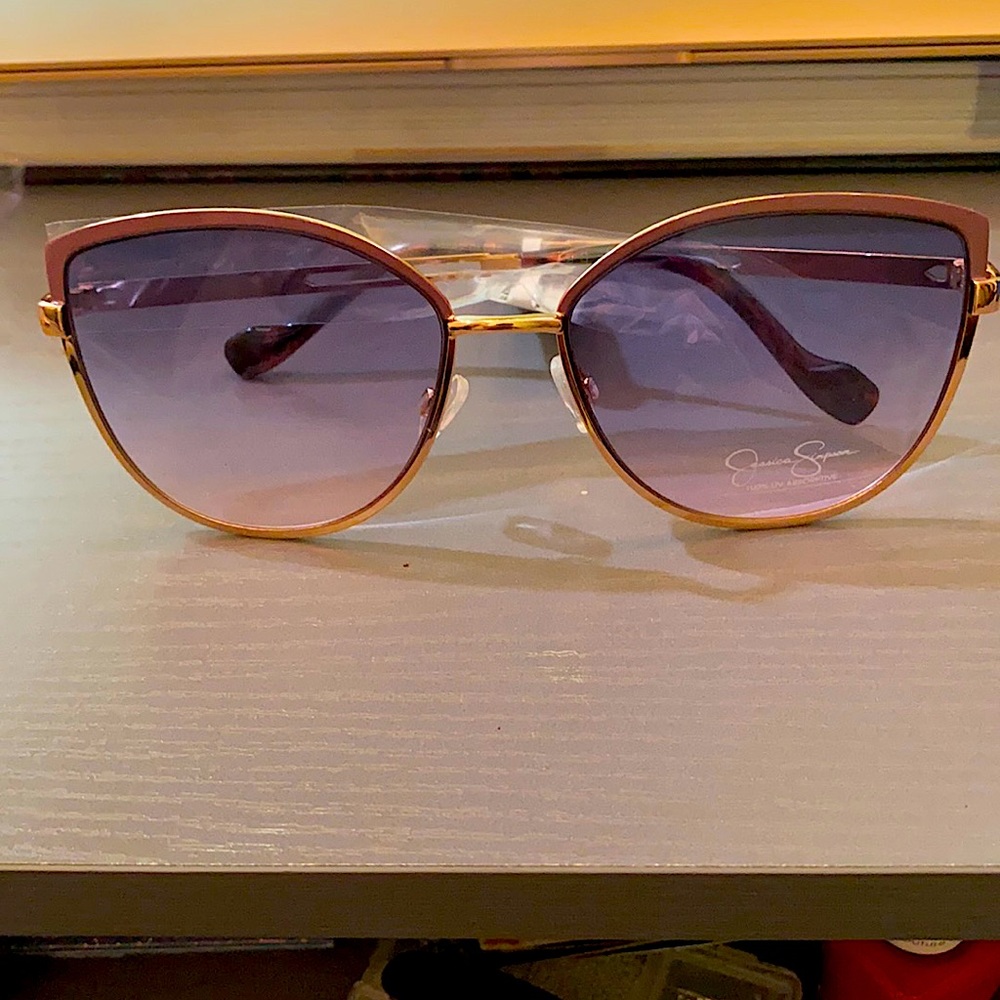 purple and pink tinted sunglasses